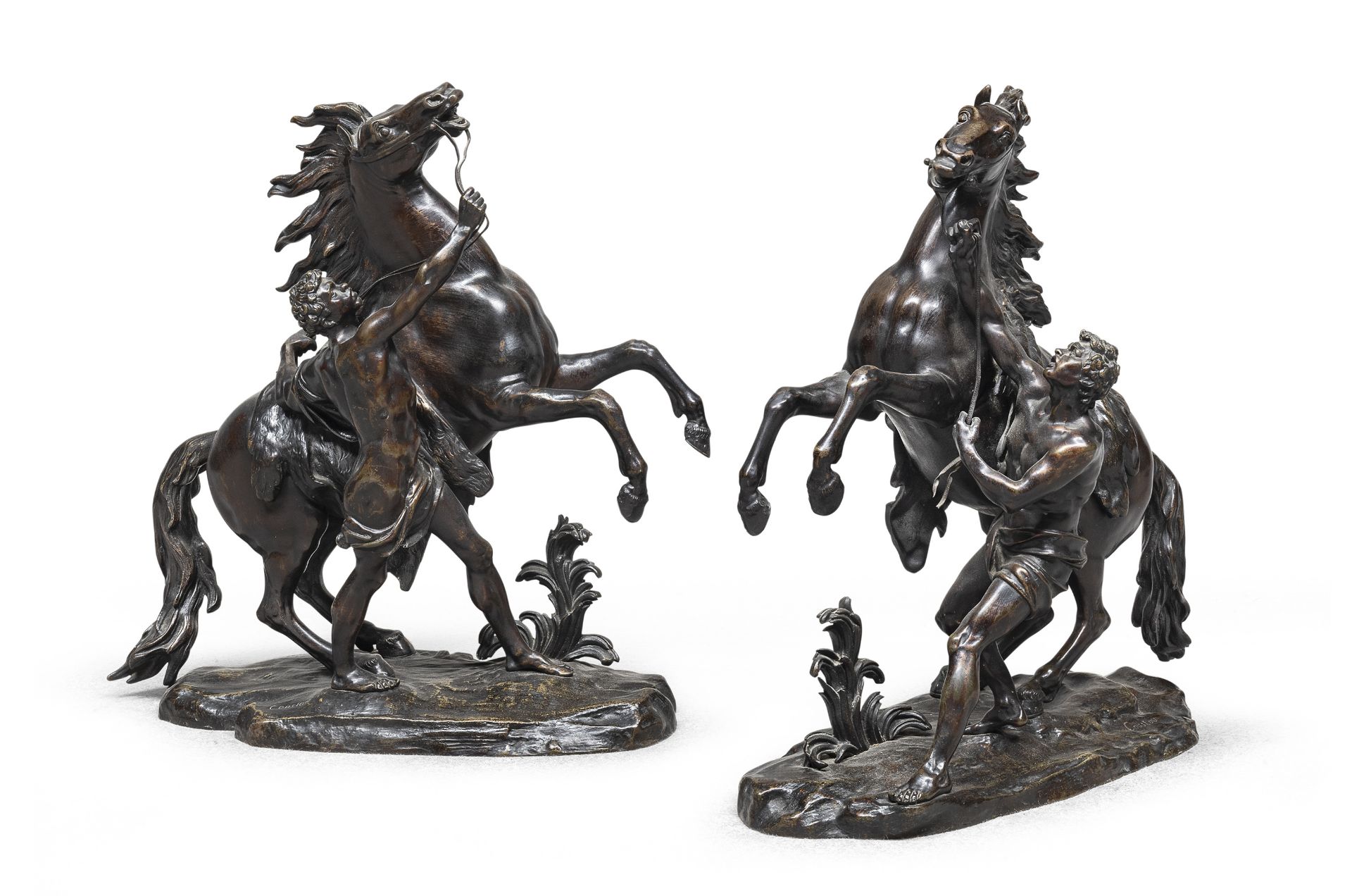 PAIR OF BRONZE SCULPTURES BY FOLLOWER OF GUILLAUME COUSTOU