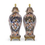 PAIR OF PORCELAIN POTICHES WITH POLYCHROME ENAMELS AND GOLD PROBABLY FRANCE 19TH CENTURY
