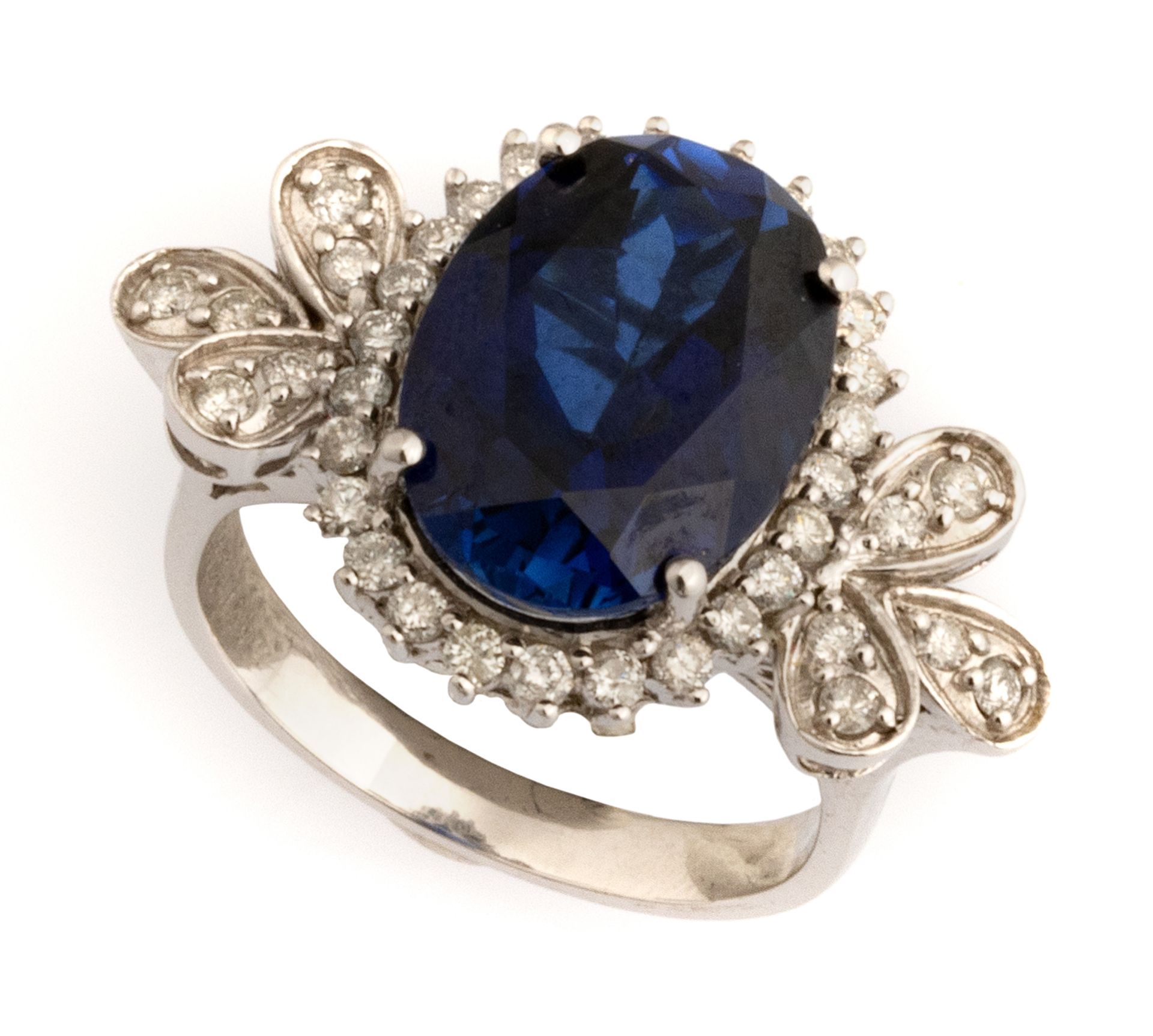 WHITE GOLD RING WITH BLUE STONE