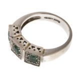 WHITE GOLD RIVIERE RING WITH EMERALDS AND DIAMONDS