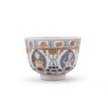 A CHINESE POLYCHROME ENAMELED PORCELAIN CUP FIRST HALF 20TH CENTURY.