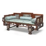 A CHINESE TEAK WOOD BED LATE 19TH CENTURY.