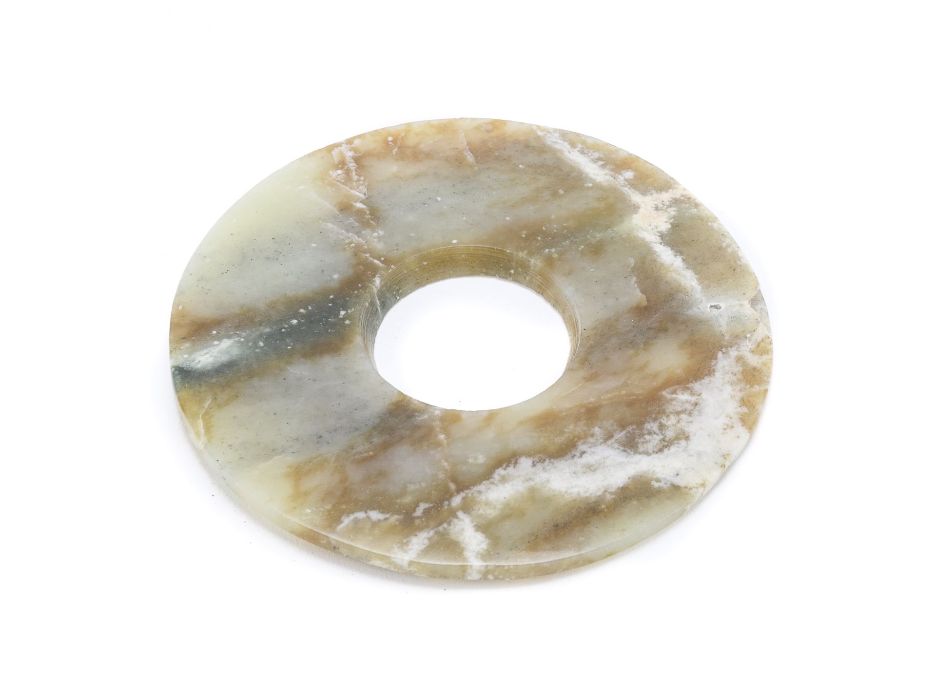 A CHINESE JADE DISK 20TH CENTURY.