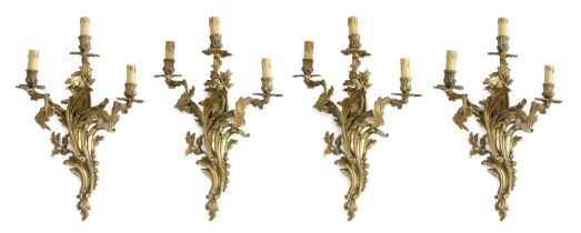 FOUR GILT BRONZE WALL LAMPS 19TH CENTURY