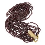 NINE STRAND GARNET NECKLACE