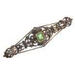 GOLD AND SILVER BAR BROOCH WITH EMERALD