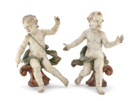 PAIR OF LACQUERED WOOD SCULPTURES OF PUTTI CENTRAL ITALY 18TH CENTURY