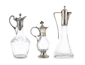 THREE PITCHERS IN GLASS AND SILVER-PLATED METAL FRANCE EARLY 20TH CENTURY