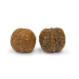 A PAIR OF CHINESE CARVED AND ENGRAVED WALNUTS 20TH CENTURY.