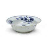 A CHINESE WHITE AND BLUE PORCELAIN BOWL 17TH CENTURY. CHIPS.