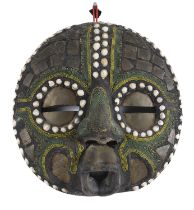 A CONGOLESE WOODEN BALUBA MASK 20TH CENTURY.