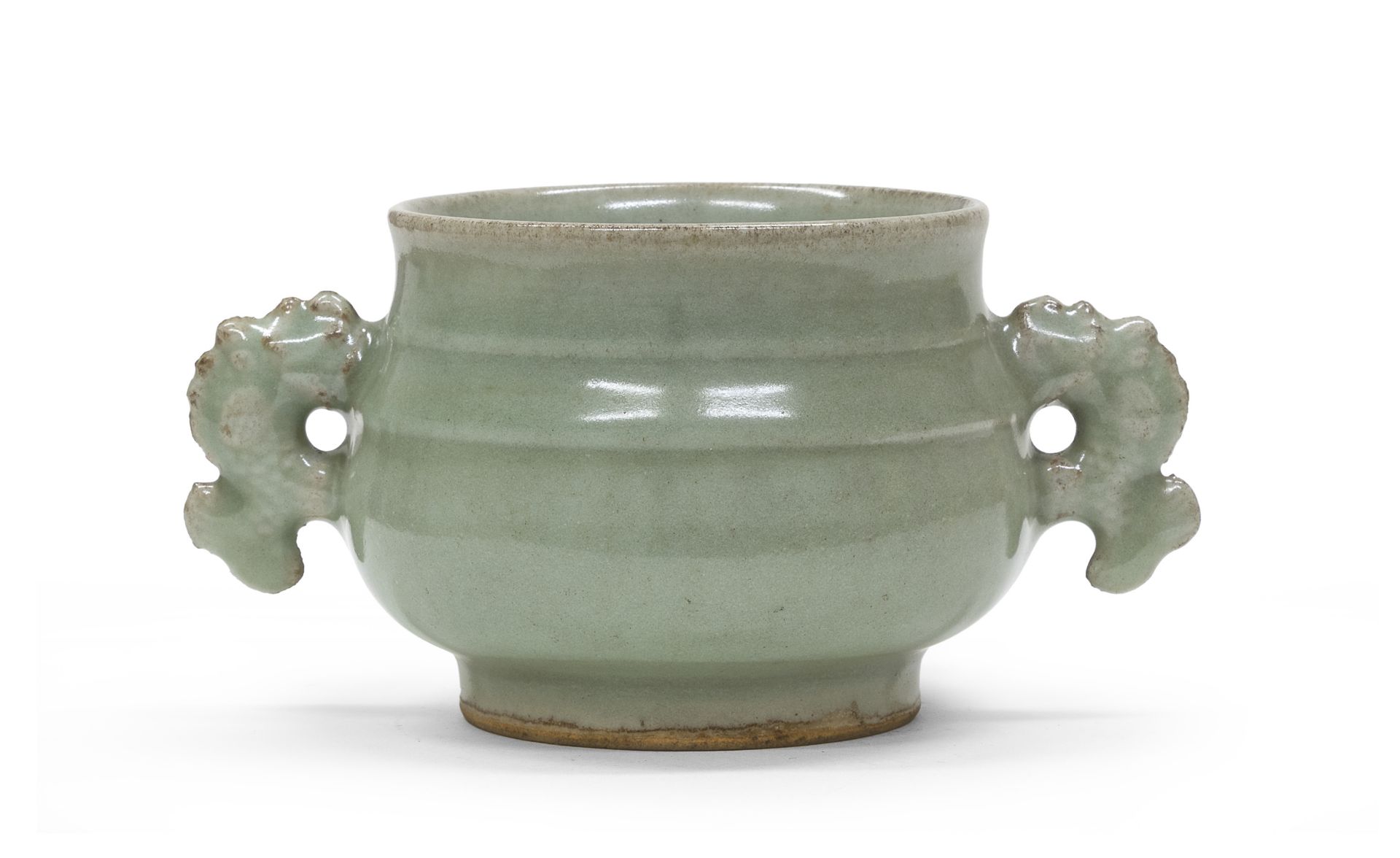 A CHINESE CELADON GLAZED PORCELAIN CENSER 17TH CENTURY.