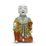 A CHINESE POLYCHROME ENAMELED PORCELAIN SCULPTURE FIRST HALF 20TH CENTURY.
