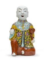 A CHINESE POLYCHROME ENAMELED PORCELAIN SCULPTURE FIRST HALF 20TH CENTURY.