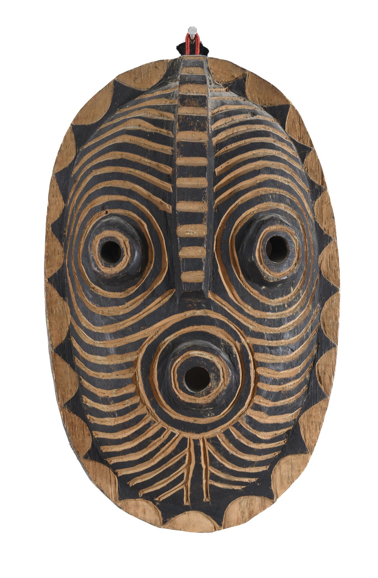 AN AFRICAN WOOD MASK 20TH CENTURY.