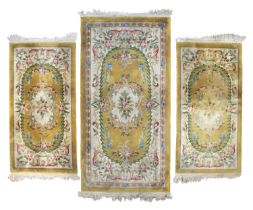 A CHINESE SET OF TIENTSIN BED RUGS MID-20TH CENTURY.