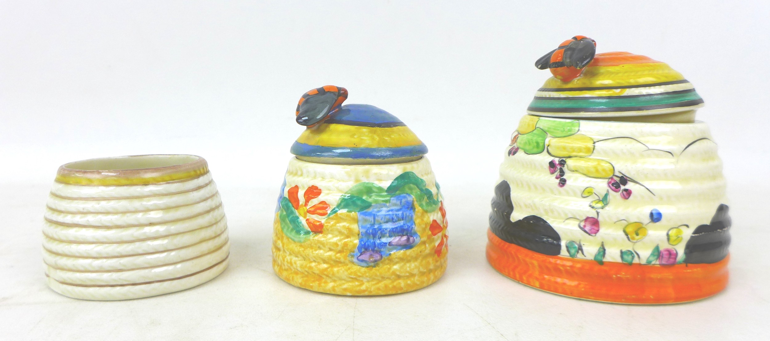 A group of three Clarice Cliff Beehive honey pots, Including 'Tulips','Canterbury Bells', and ' - Image 2 of 3