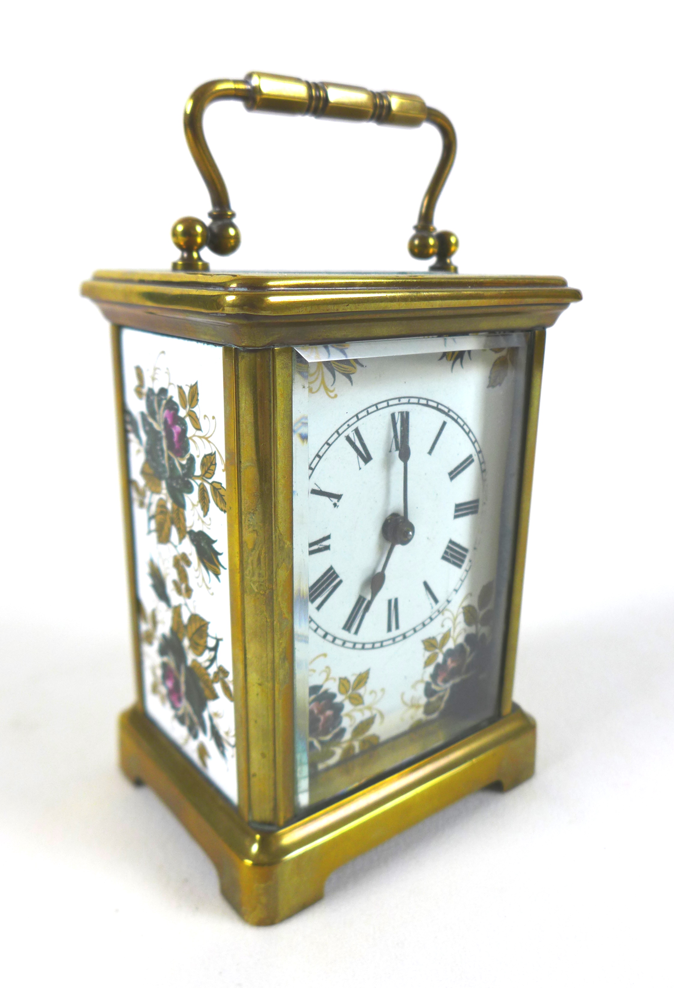 A mid 20th century brass cased carriage clock, the white enamel dial decorated with painted flowers, - Image 5 of 8