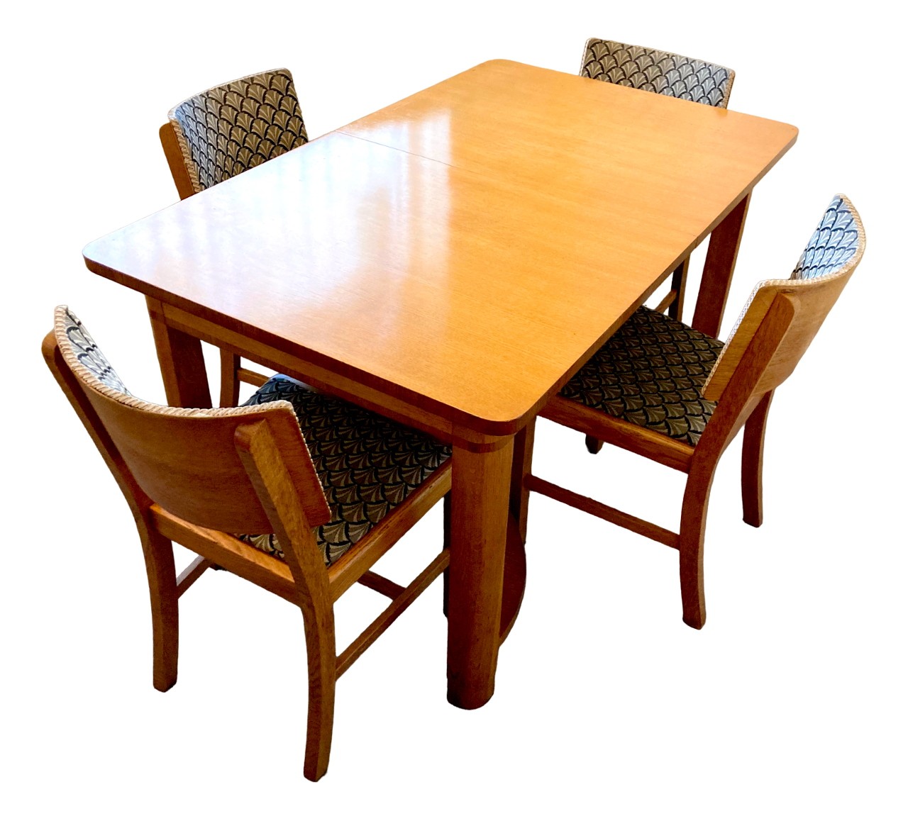 An Art Deco Maple & Co oak dining table, the extending draw leaf surface of rectangular form with
