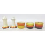 A collection of Clarice Cliff banded wares, including a Muffineer salt and pepper pot, 8cm high, and