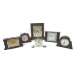 A collection of Art Deco wooden and bakelite mantle clocks, largest 31 by 10.5 by 28cm high,