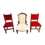 A Victorian nursing chair, with mahogany frame and cream upholstered back and seat, raised upon