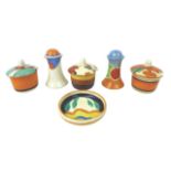 A mixed group of Clarice Cliff, including three cruet mustard pots, including two 'Farmhouse' and