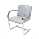 A vintage Knoll BRNO open armchair, designed by Ludwig Mies van Der Rohe and Lilly Reich, chromed