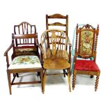 A group of six chairs, comprising an oak Windsor side chair, a rush seated oak ladderback chair, a