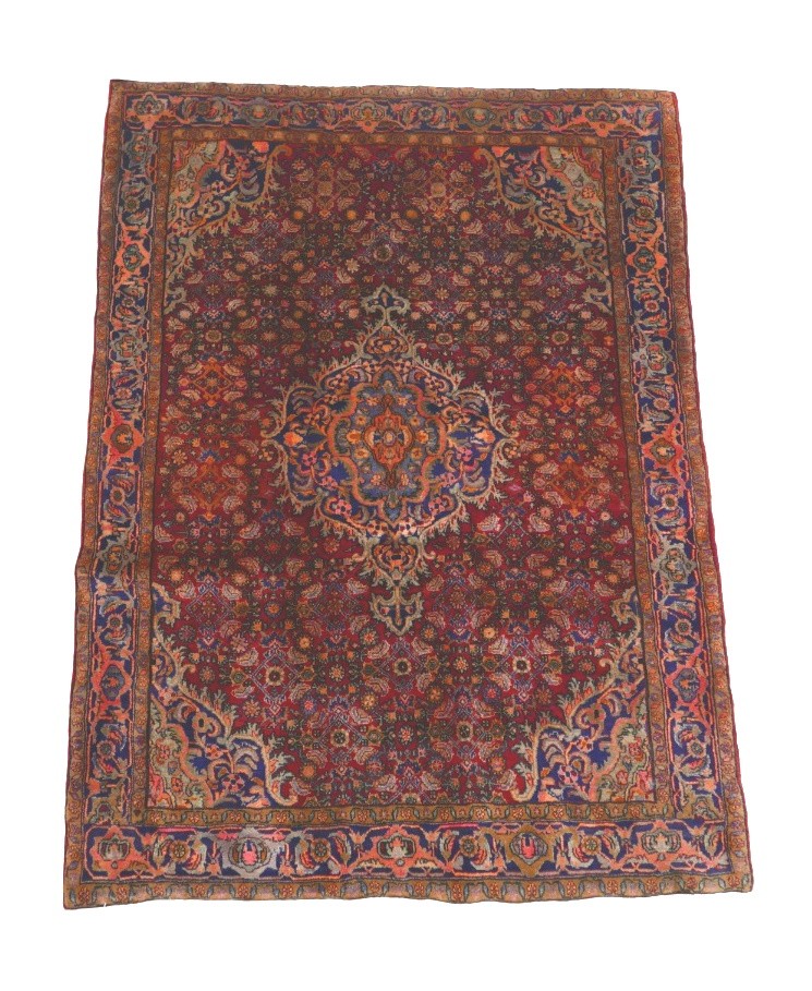 A Bijar rug, on red ground, blue central medallion with pendant anchors, on densely decorated field,