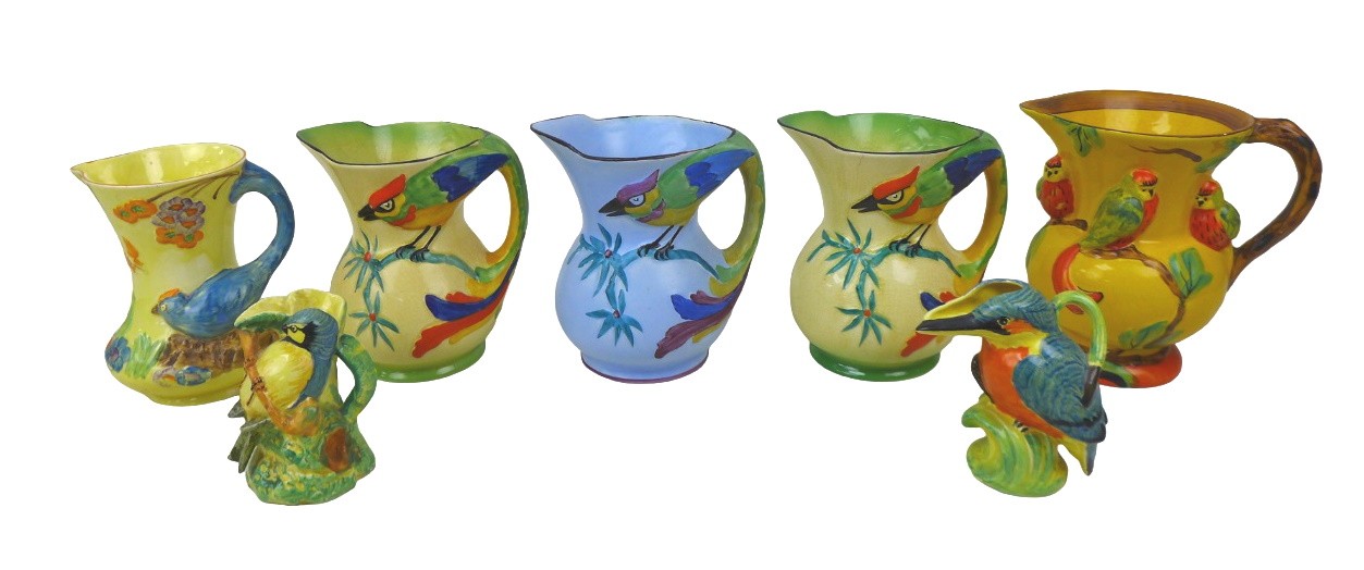 A collection of Art Deco jugs depicting birds, including Burleigh Ware Kingfisher, 12cm high, and