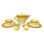 A Clarice Cliff conical Bizzare tea service, pattern number '5829', in 'Sunshine Bands'