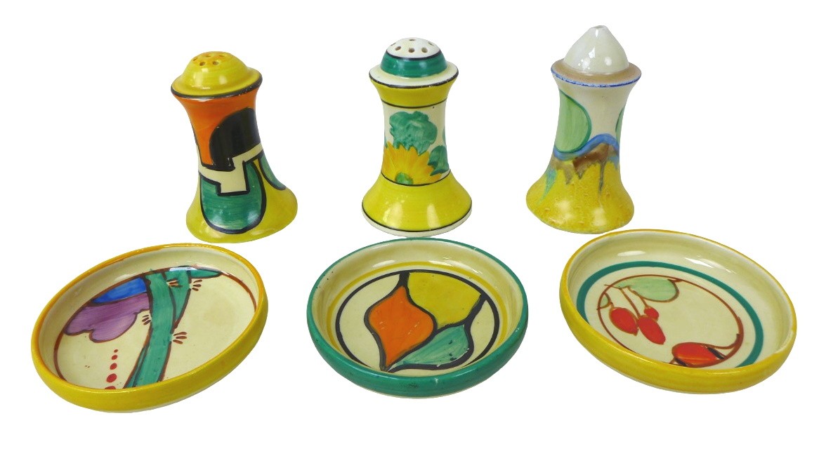 A mixed group of Clarice Cliff, including a 'Castellated Circle' and 'Sungay' Muffineer pepper pots, - Image 2 of 3