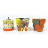 A group of Clarice Cliff pots, comprising an 'Xavier' shape 368 fern pot, of square stepped form,