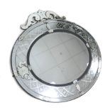 A modern Venetian style wall mirror, with oval plate and engraved decoration with floral surmount,