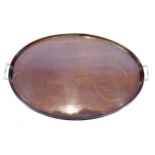 A 19th century mahogany tray, oval with twin brass handles, 78 by 50 by 7cm high.