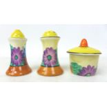 A Clarice Cliff 'Gay Day' Muffineer cruet set, Bizarre mark to the base, tallest 8cm high. (3)