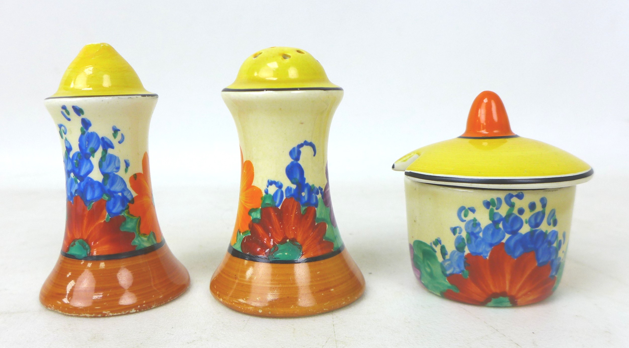 A Clarice Cliff 'Gay Day' Muffineer cruet set, Bizarre mark to the base, tallest 8cm high. (3) - Image 2 of 3