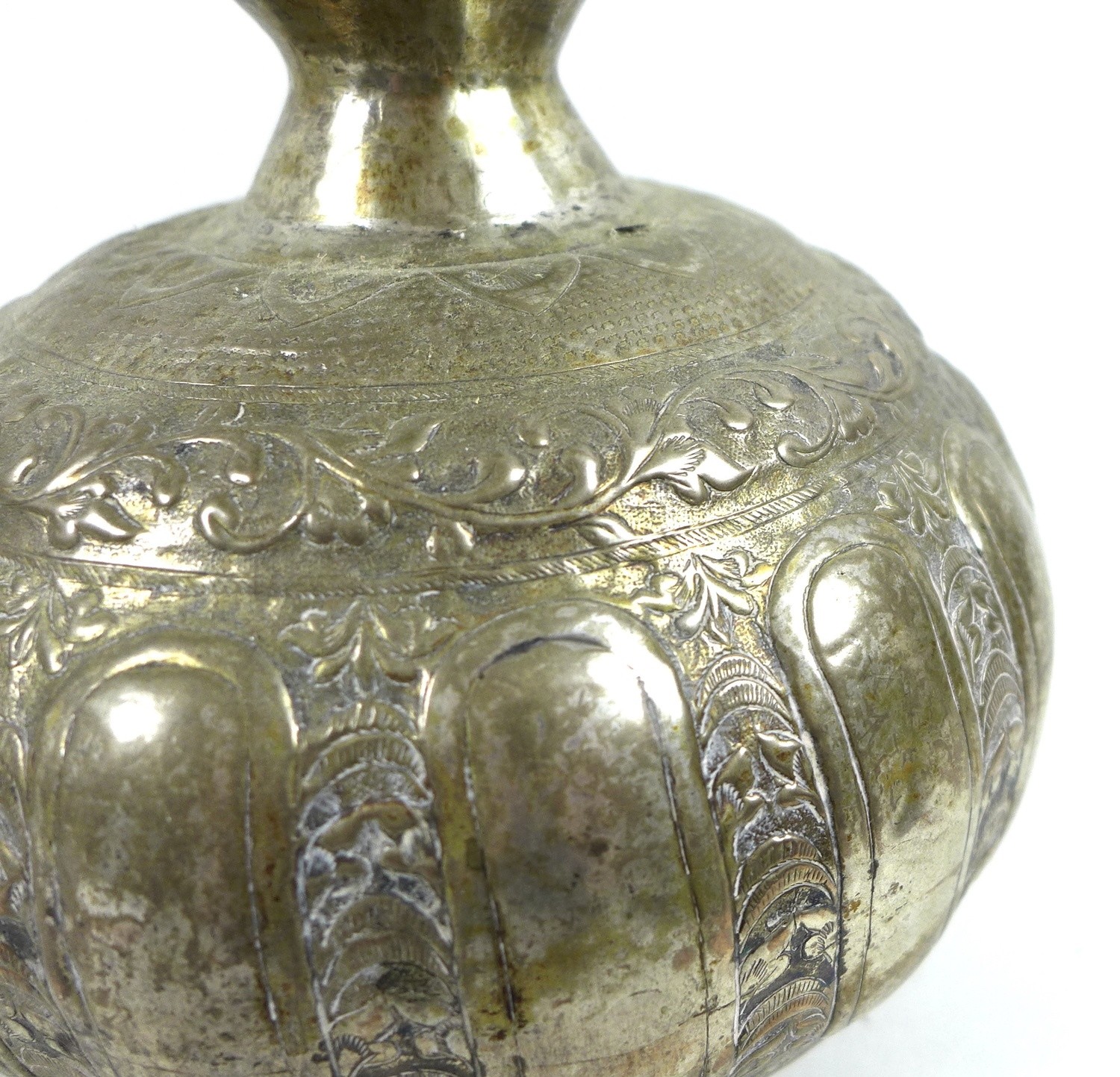 A white metal or brass silvered bottle vase, likely 19th century Indian the gourd form base - Image 5 of 5