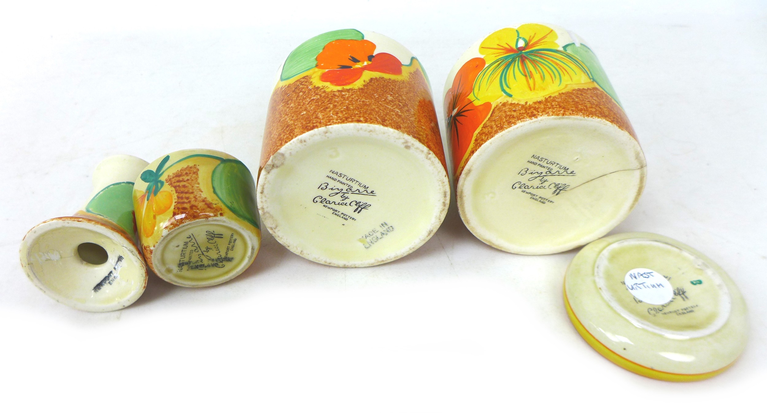 A collection of Clarice Cliff 'Nasturtium' pieces, comprising two drum shaped preserve pots, without - Image 3 of 3