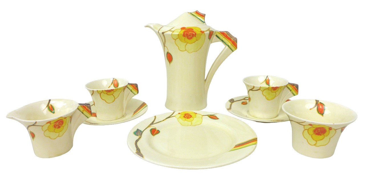 A Clarice Cliff Daffodil part coffee serice, pattern number '2209', in 'Yellow Rose' decoration,