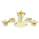 A Clarice Cliff Daffodil part coffee serice, pattern number '2209', in 'Yellow Rose' decoration,