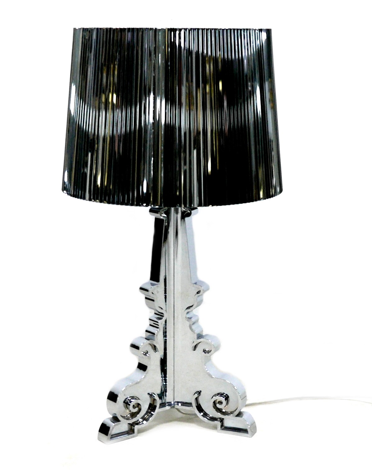 A Kartell Bourgie perspex table lamp, silvered finish, designed by Ferruccio Laviani, 32 by 69cm