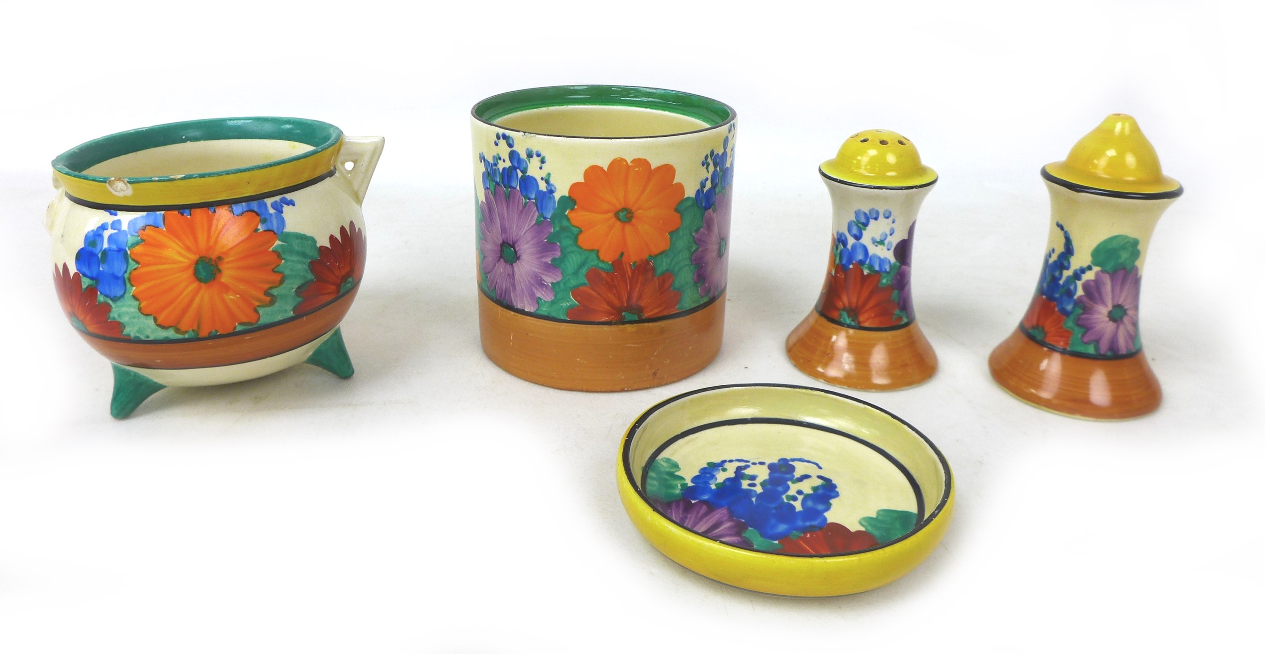 A collection of Clarice Cliff 'Gay Day' pieces, comprising a Cauldron pot, missing handle, 7cm high,