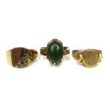 A group of three gold rings, comprising a 9ct gold vintage design ring with a jade cabochon in