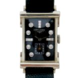 An Art Deco Longines 14k white gold gentleman's tank wristwatch, with diamond set black dial