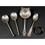 A small group of silver, comprising two seal top spoons, 13cm, a strainer spoon, 15cm, a teaspoon,