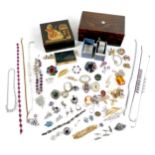 A small group of costume jewellery, including a silver hinged bangle, 39.6g, boxed, a vintage