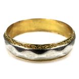A 22ct yellow gold and platinum wedding band ring, 4.5mm wide, size L, 3.4g.