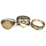 A group of three 9ct gold rings, comprising one tri-colour, size J, one set with a 'Emperador
